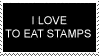 a stamp thats getting bite marks taken out of it. reads: 'i love to eat stamps'